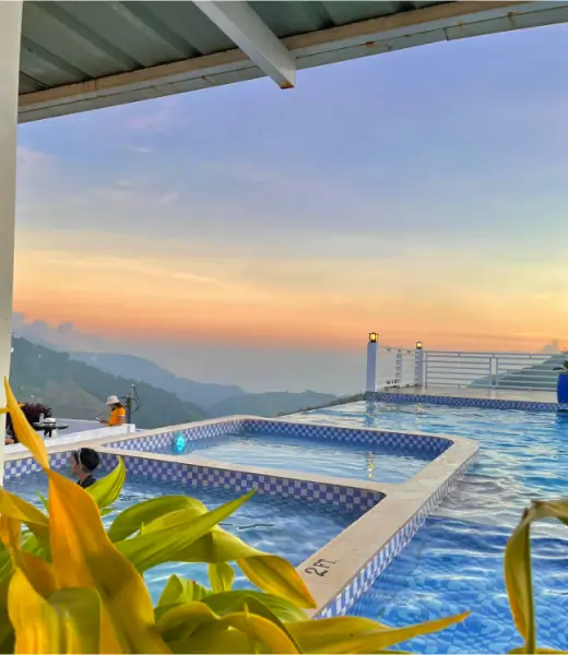 Montefrio infinity pool with mountain sunset view